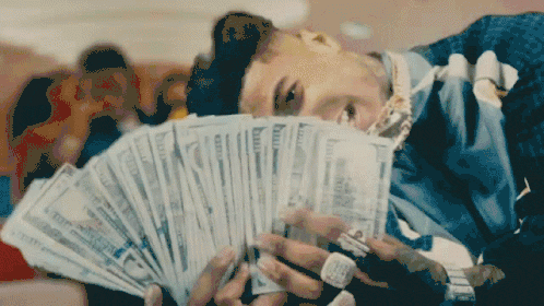 Cash in hand representing web design budget