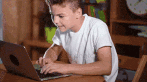 Young person using a laptop computer