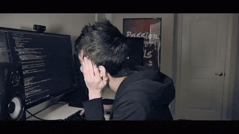 A developer writing code for a responsive web layout