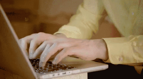 Person typing at a computer searching the internet