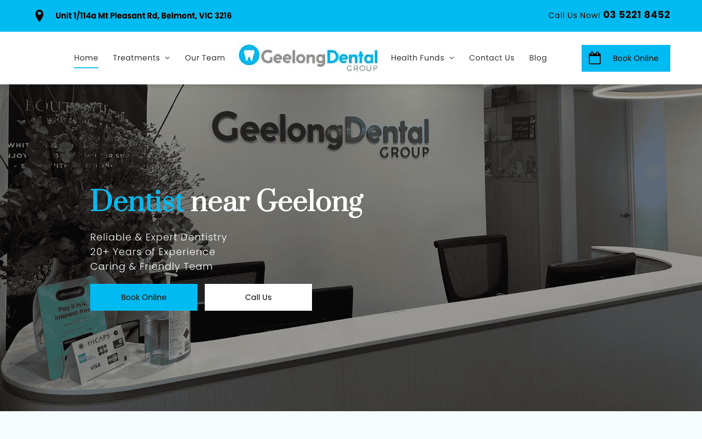 Modern dental clinic reception area in Geelong with sleek design, comfortable seating, and dental branding, showcasing a professional environment for dental care services.