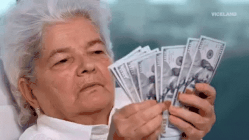 Animated GIF of a grandma counting cash with a sassy look