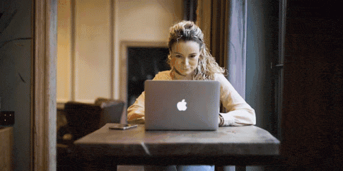 Someone working on a laptop during a website design build process