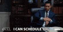 Office worker offering to schedule an appointment