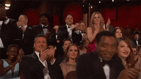 Audience applauding in a theatre